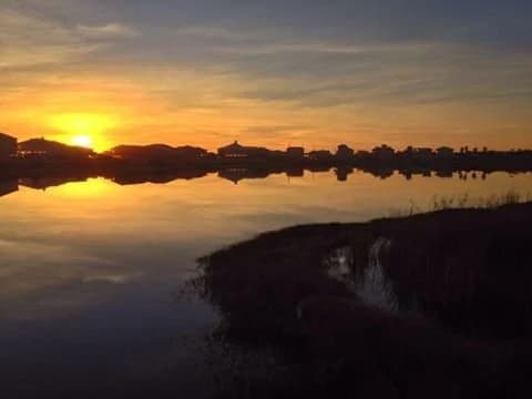 Sunset over Oyster Lake, a coastal dune lake in Santa Rosa Beach, Florida